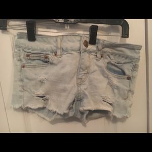 Light Distressed Denim Shorts